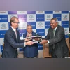 (L-R)-Mr. Andrew Lo, Senior Managing Director and CEO of Invesco Asia Pacific, Mr. Ashok Hinduja, Chairman, IIHL and Moses Harding, CEO, IIHL at the signing ceremony