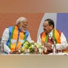 Best of BS Opinion: Human development, signalling continuity, more Prime Minister Narendra Modi and BJP National President JP Nadda during the release of party's election manifesto ‘Sankalp Patra' for the Lok Sabha polls, at the party headquarters, in New Delhi, Sunday, April 14, 2024 (PTI Photo)