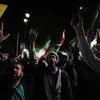 Iranian demonstrators chant slogans during an anti-Israeli gathering in front of the British Embassy in Tehran, Iran
