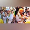 Congress candidate Virendra Rawat greeting people during his election campaign at a market in Haridwar (Photo: X/ @virenderrawatuk) (left) and BJP candidate Trivendra Singh Rawat in a road show at Jwalapur Assembly (Photo: X/ @tsrawatbjp) Congress candidate Virendra Rawat greeting people during his election campaign at a market in Haridwar (Photo: X/ @virenderrawatuk) (left) and BJP candidate Trivendra Singh Rawat in a road show at Jwalapur Assembly (Photo: X/ @tsrawatbjp)