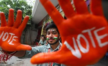 Jammu: School students with their faces and hands painted with words to encourage people to vote, pose for photographs ahead of the Lok Sabha elections, in Jammu, Thursday, April 18, 2024. (PTI Photo) Jammu: School students with their faces and hands painted with words to encourage people to vote, pose for photographs ahead of the Lok Sabha elections, in Jammu, Thursday, April 18, 2024. (PTI Photo)