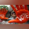 Jammu: School students with their faces and hands painted with words to encourage people to vote, pose for photographs ahead of the Lok Sabha elections, in Jammu, Thursday, April 18, 2024. (PTI Photo) Jammu: School students with their faces and hands painted with words to encourage people to vote, pose for photographs ahead of the Lok Sabha elections, in Jammu, Thursday, April 18, 2024. (PTI Photo)