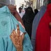 Kairana: Muslim voters show their ink-marked fingers after casting their votes during the first phase of Lok Sabha elections, in Kairana, Uttar Pradesh, Friday, April 19, 2024. (PTI Photo/Arun Sharma)