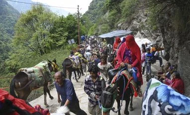 Govt issues alert about online frauds targeting Char Dham pilgrims Pilgrims, Kedarnath temple Pilgrims