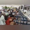 Polling official, EVM, election Polling official, EVM, election