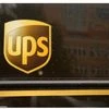 UPS to cut 20,000 jobs on lower Amazon shipments; profit beats estimates