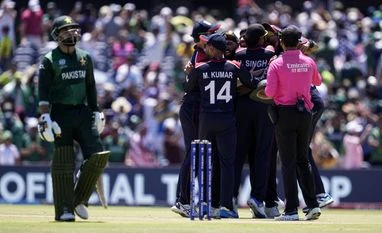 Pakistan's Shadab Khan, left, walks off the field as players of United States celebrate after their win in the ICC Men's T20 World Cup cricket match against Pakistan at the Grand Prairie Stadium in Grand Prairie, Texas. File photo: PTI Pakistan's Shadab Khan, left, walks off the field as players of United States celebrate after their win in the ICC Men's T20 World Cup cricket match against Pakistan at the Grand Prairie Stadium in Grand Prairie, Texas. File photo: PTI