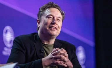 Elon Musk launches poll on X asking if Tesla should invest $5 bn in xAI Elon Musk, Tesla
