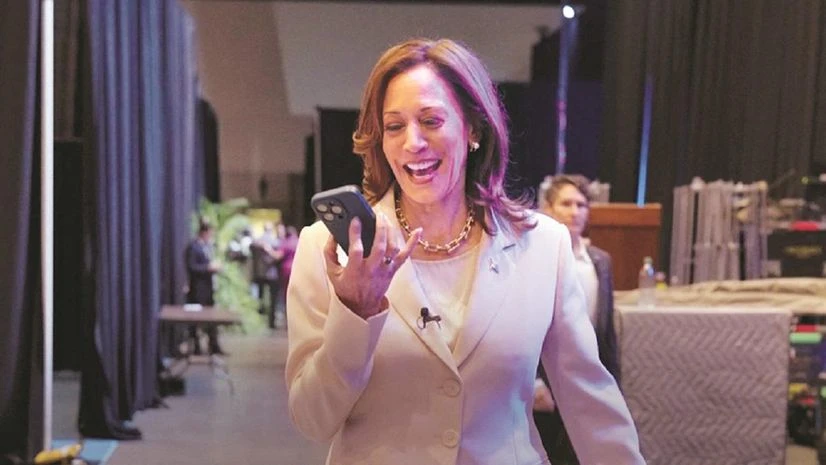 US Vice President Kamala Harris speaks on the phone with former President Barack Obama and former first lady Michelle Obama on Friday US Vice President Kamala Harris speaks on the phone with former President Barack Obama and former first lady Michelle Obama on Friday