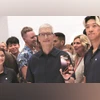 Apple CEO Tim Cook holds the new iPhone 16 during an event at the Steve Jobs Theater on the company's campus in California, on Monday. (Photo: Reuters) Apple CEO Tim Cook holds the new iPhone 16 during an event at the Steve Jobs Theater on the company’s campus in California, on Monday. (Photo: Reuters)