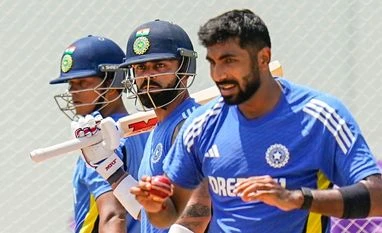 IND-BAN 2nd Test: Bumrah, Axar, Ashwin dismiss Kohli multiple times in nets Jasprit Bumrah and Virat Kohli. Photo: PTI