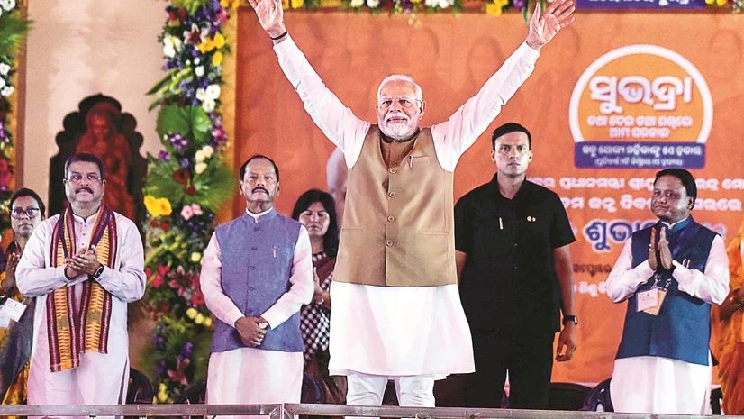 Subhadra Yojana: How women beneficiaries can get Rs 10,000 a year | Personal Finance Prime Minister Narendra Modi at the launch of the Subhadra Yojana in Bhubaneswar on Tuesday photo: pti