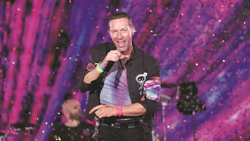 British rock band Coldplay on Sunday added a third show to the Mumbai leg of its "Music Of The Spheres World Tour 2025" citing "phenomenal demand", hours after fans expressed disappointment over long virtual queues on the online ticket platform BookM British rock band Coldplay on Sunday added a third show to the Mumbai leg of its "Music Of The Spheres World Tour 2025" citing "phenomenal demand", hours after fans expressed disappointment over long virtual queues on the online ticket platform BookM