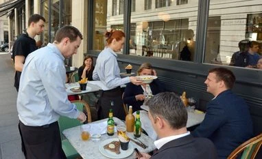 UK waiters to take home more cash as 'tipping laws' come into force London, waiters
