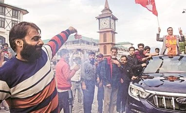 Jammu and Kashmir National Conference (JKNC) supporters celebrate the party's win in Srinagar. (Photo: PTI) Jammu and Kashmir National Conference (JKNC) supporters celebrate the party’s win in Srinagar. (Photo: PTI)