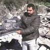 A journalist at the site where an Israeli airstrike hit a compound housing three journalists, in Hasbaya village, southeast Lebanon, on Friday. (PHOTO: AP/PTI)