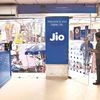 Billionaire Mukesh Ambani targets a 2025 Mumbai listing for his telecom business Jio, valued by analysts at over $100 billion, and plans to launch his retail unit's initial public offering (IPO) much later, two people familiar with the matter said.