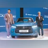 Maruti Suzuki India MD & CEO Hisashi Takeuchi (right) and Senior Executive Officer, Marketing and Sales, Partho Banerjee at the launch of the new Dzire on Monday Maruti Suzuki India MD & CEO Hisashi Takeuchi (right) and Senior Executive Officer, Marketing and Sales, Partho Banerjee at the launch of the new Dzire on Monday