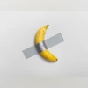 Duct-taped banana artwork sold at US $6.2m Duct-taped banana artwork sold at US $6.2m
