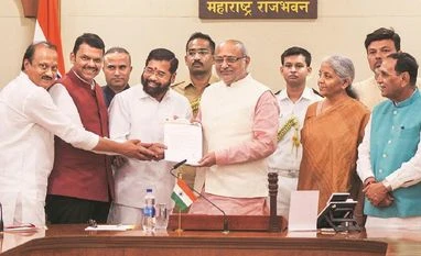 (Left to right) NCP leader Ajit Pawar, BJP leader Devendra Fadnavis, outgoing CM and Shiv Sena leader Eknath Shinde meet Maharashtra Governor C P Radhakrishnan in Mumbai on Wednesday. Finance Minister Nirmala Sitharaman was present as a central obser (Left to right) NCP leader Ajit Pawar, BJP leader Devendra Fadnavis, outgoing CM and Shiv Sena leader Eknath Shinde meet Maharashtra Governor C P Radhakrishnan in Mumbai on Wednesday. Finance Minister Nirmala Sitharaman was present as a central obser