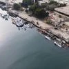 A drone view shows damages at Latakia port after Israeli military said it struck Syrian defence facilities, Syria December 11, 2024. | Photo by Salaah Jeaar, Reuters