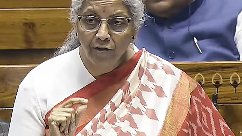 New Delhi: Union Finance Minister Nirmala Sitharaman speaks in the Lok Sabha during the Winter session of Parliament, in New Delhi, Tuesday, Dec 17, 2024 (PTI Photo) New Delhi: Union Finance Minister Nirmala Sitharaman speaks in the Lok Sabha during the Winter session of Parliament, in New Delhi, Tuesday, Dec 17, 2024 (PTI Photo)