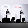 Toshihiro Mibe, right, speaks next to Makoto Uchida, during a joint news conference in Tokyo in August. Toshihiro Mibe, right, speaks next to Makoto Uchida, during a joint news conference in Tokyo in August.