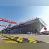 China launches amphibious assault ship that can launch fighter jets China's amphibious battle ship
