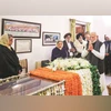 Prime Minister Narendra Modi pays tribute to former PM Manmohan Singh, in New Delhi on Friday photo: pti Prime Minister Narendra Modi pays tribute to former PM Manmohan Singh, in New Delhi on Friday photo: pti