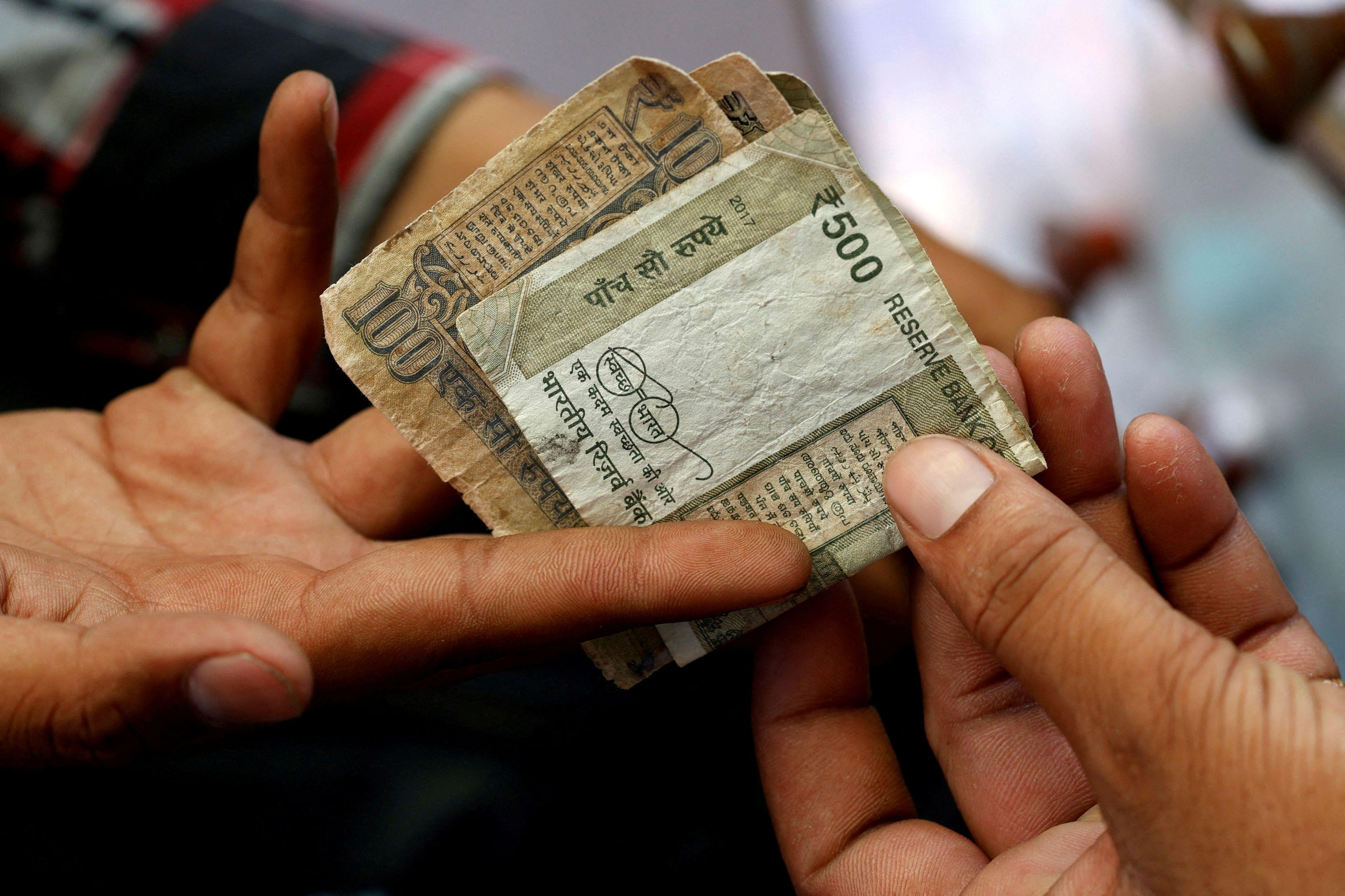 Rupee falls 5 paise to 87.11 against US dollar during early trade | Finance  News - Business Standard