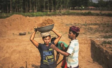 Govt rejects allegations of bias in MGNREGA fund release amid Oppn protest MGNREGA