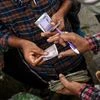 Indian Rupee gains after snapping nine-day rally; Opens at 85.68/$