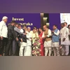 Jindal, Mahindra groups propose Rs 1.4 trillion investment in Karnataka Defence Minister Rajnath Singh (right) said Bengaluru will create the country's first foundation AI model