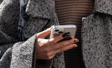 Airtel, Google team up to offer cloud storage to postpaid, Wi-Fi users apple, iPhone, a person holding mobile, call, text