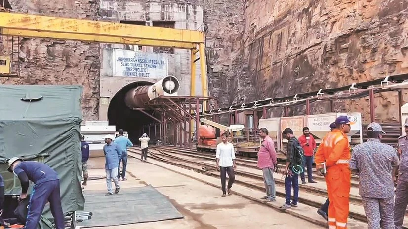 Rescue teams at the Srisailam Left Bank Canal (SLBC) project site where a portion of the tunnel collapsed, in Nagarkurnool district. The Telangana govt has called in experts from GSI and NGRI to suggest way forward for the rescue of eight persons Rescue teams at the Srisailam Left Bank Canal (SLBC) project site where a portion of the tunnel collapsed, in Nagarkurnool district. The Telangana govt has called in experts from GSI and NGRI to suggest way forward for the rescue of eight persons