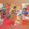 Farm workers pack strawberries for transportation in Palla, a village on the outskirts of Delhi