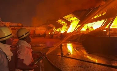 Multi-disciplinary team to submit report on Hyderabad fire: Minister Firefighters and fire tendors deployed at the site trying get control of the fire in warehouse. | Photo: PTI