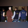 NIA officials with Tahawwur Rana in New Delhi. (Image: ANI)