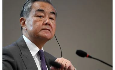 China's Wang Yi vows to stand firm, urges nations to resist 'bully' Trump Wang Yi