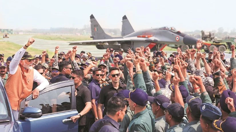 Prime Minister Narendra Modi with armed force personnel at the Adampur air base in Punjab on Tuesday photo: pti Prime Minister Narendra Modi with armed force personnel at the Adampur air base in Punjab on Tuesday photo: pti