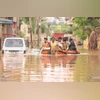Residents being rescued from a waterlogged area after heavy rain in Bengaluru, on Monday. Over the past few days, the city has seen cloudbursts with 15–20 centimetres of rainfall | PHOTO: PTI Residents being rescued from a waterlogged area after heavy rain in Bengaluru, on Monday. Over the past few days, the city has seen cloudbursts with 15–20 centimetres of rainfall | PHOTO: PTI
