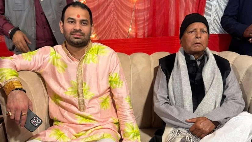 Tej Pratap Yadav with Lalu Yadav Tej Pratap Yadav with Lalu Yadav