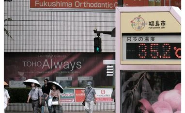 Japan, heat, Japanese People walk on streets in Japan
