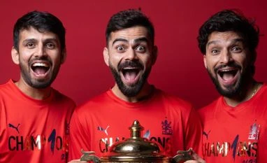 Rajat will lead RCB for a long time, says Kohli during RCB's victory parade Kohli, Jitesh and Rajat with IPL 2025 trophy