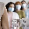 women getting vaccine shots