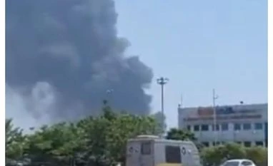 Plane crash, smoke Smoke visible after a plane crashed near Ahmedabad