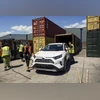 Workers at Felixstowe port recover a stolen Toyota RAV4 from a container Workers at Felixstowe port recover a stolen Toyota RAV4 from a container