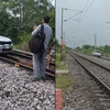 woman drives car on railway track