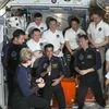 Crew members aboard International Space Station resume space science work