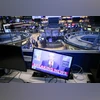 A television broadcasts US President Donald Trump during a NATO press conference on the floor of the New York Stock Exchange on June 25, 2025